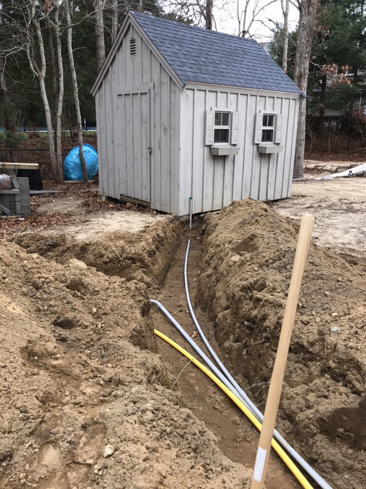 Electrical underground conduit to power shed